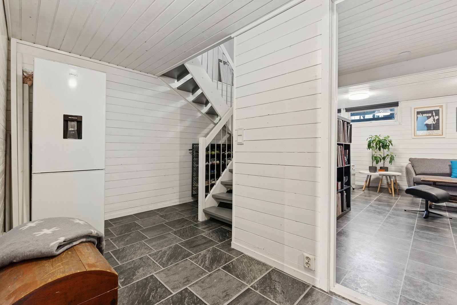 Trapperom i kjelleren som gir tilgang til etasjens ulike rom. Galleribilde