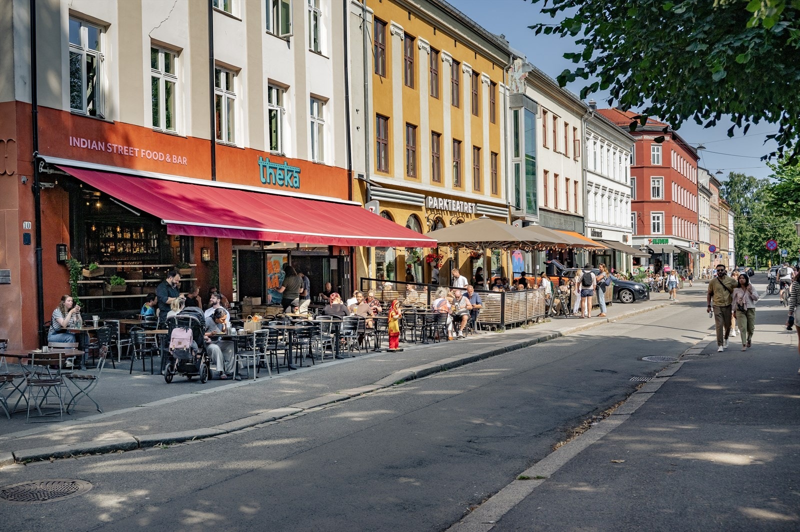 Et levende område med et rikt utvalg av caféer, restauranter og butikker. Galleribilde