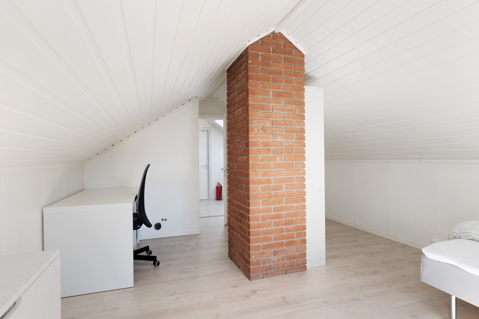 Den murte pipa er eit synleg element på loftet. Galleribilde