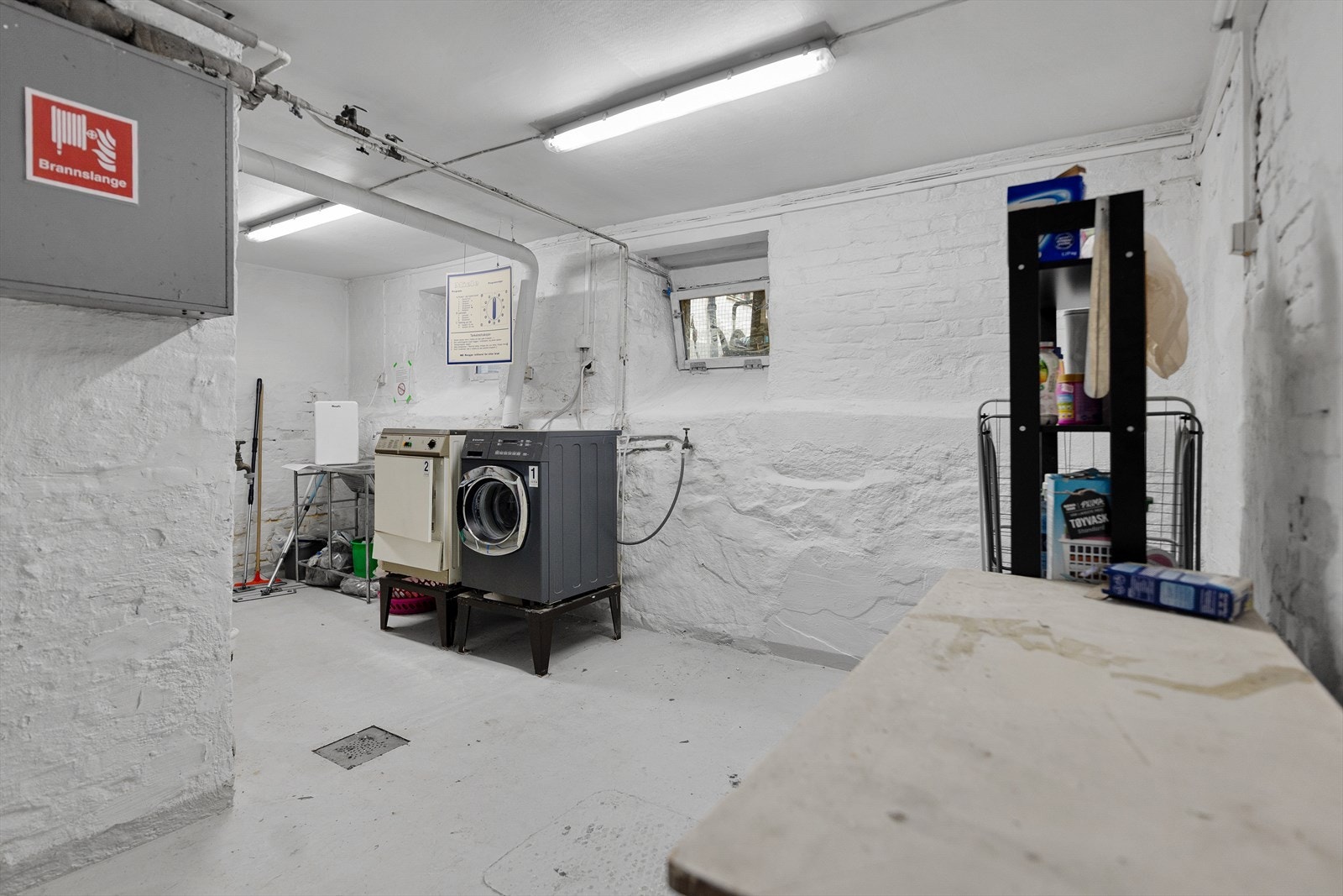 Borettslaget har fellesvaskeri i kjelleren. Galleribilde