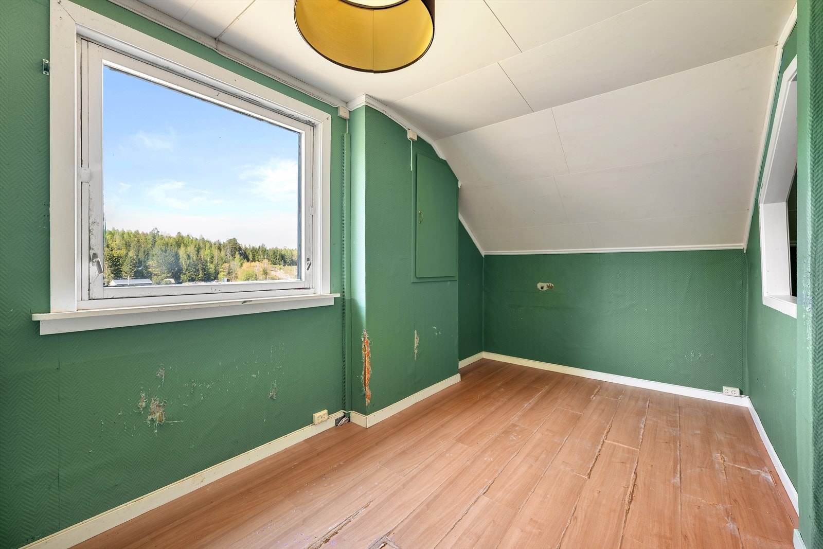 Her får du flott og landlig utsikt over jordene, skogen og det lille, koselige nabolaget Galleribilde