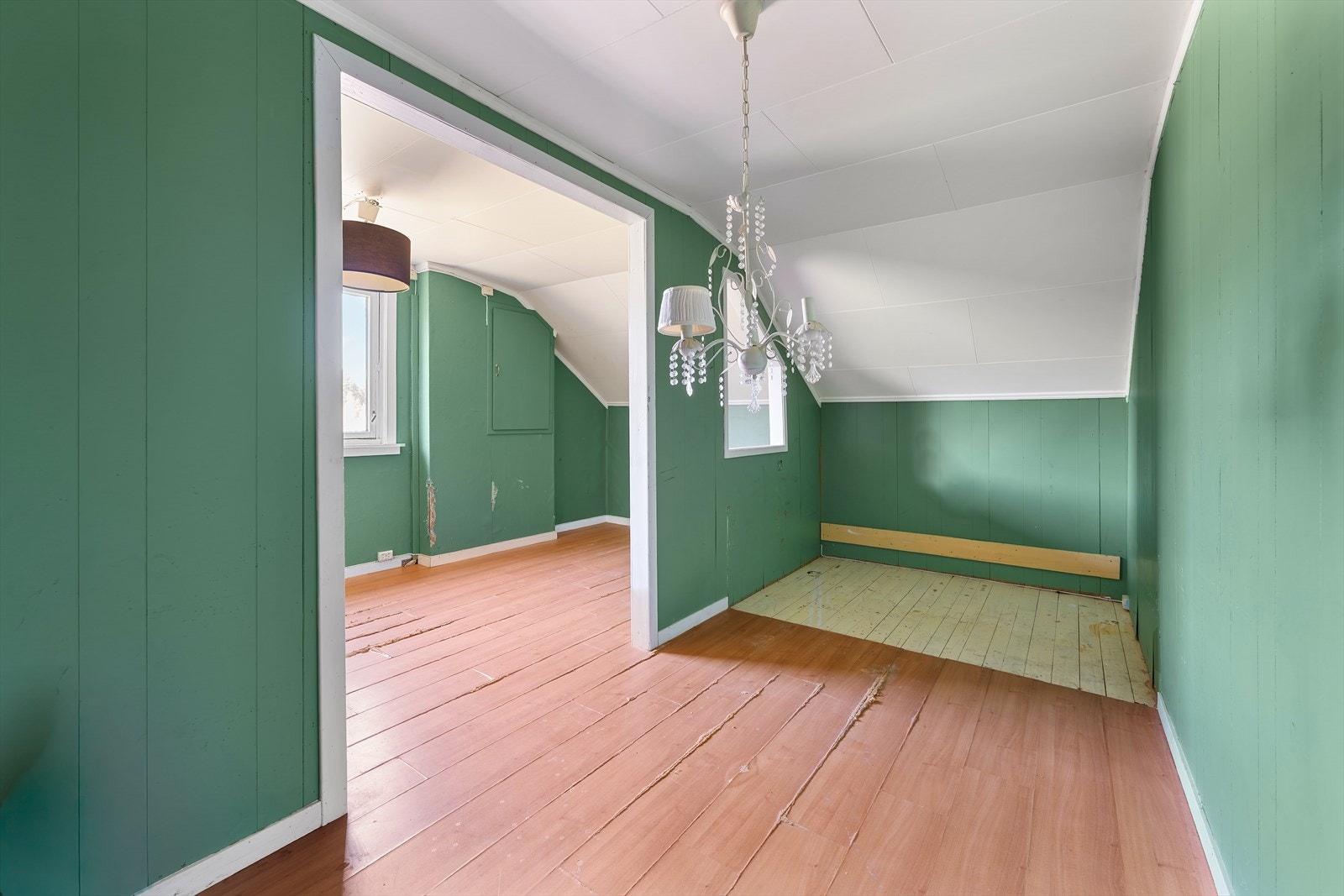 Dette rommet fremstår som ett stort rom på bygningstegninger, betegnet som "uinnredet". Galleribilde