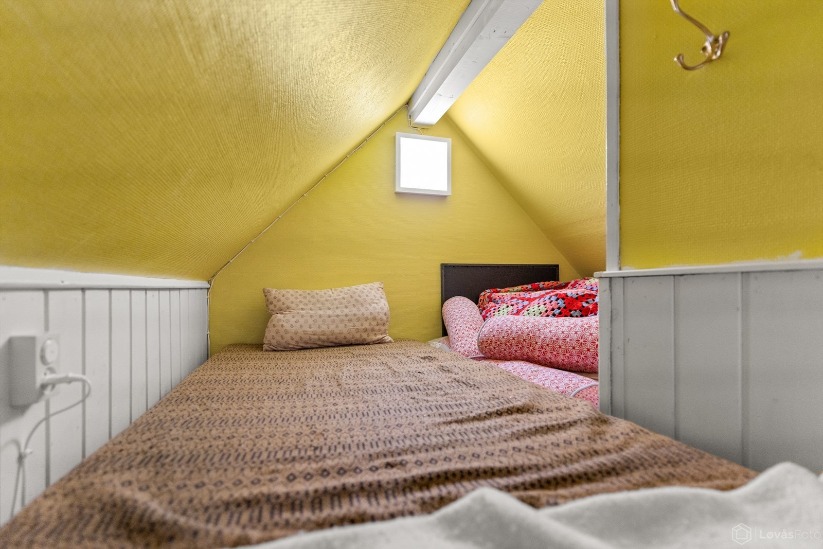 For familier med barn blir hemsen et ekstra rom med mange muligheter til lek og kos - eller lagring. Galleribilde