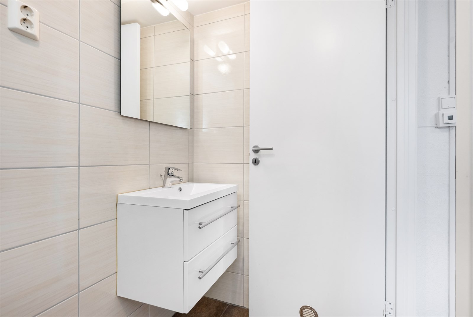 Varme i gulv på badet. Galleribilde