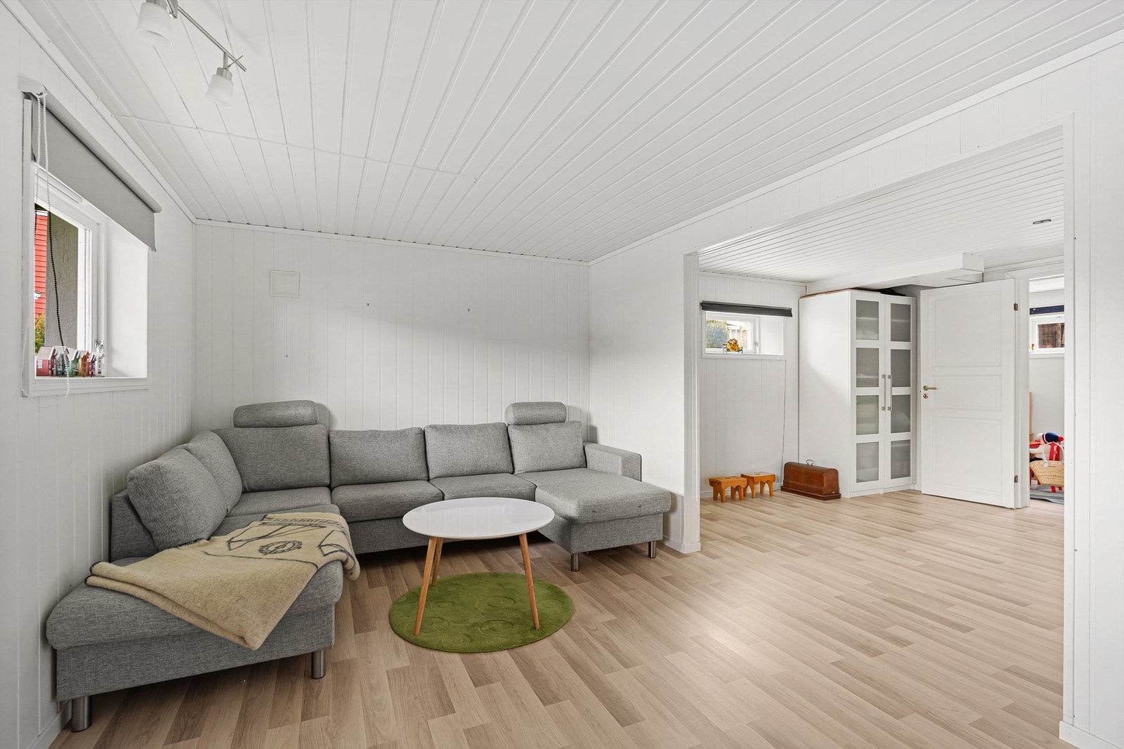 I første etasje er det en ekstra stue, som gir fleksibilitet for familien. Galleribilde