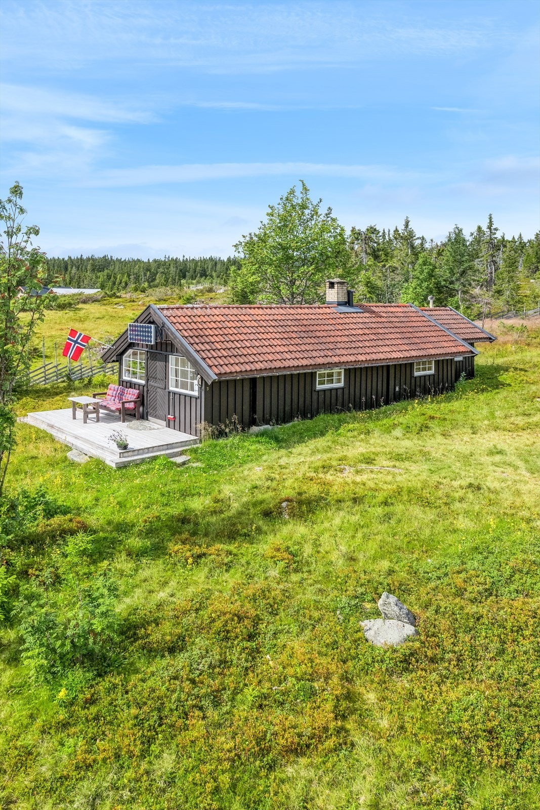 Hytta med omland Galleribilde