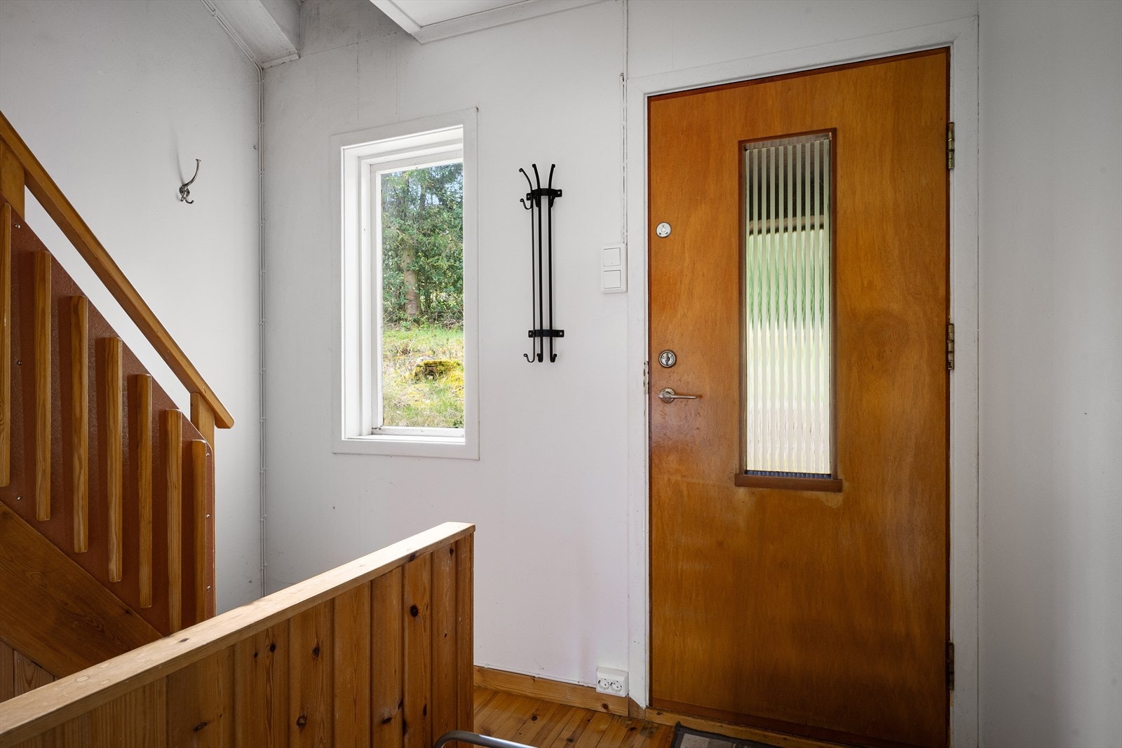 Entré med trappeforbindelse til de andre etasjene. Galleribilde