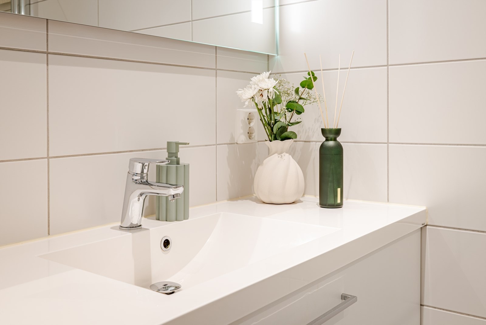 Badet fremstår som helhetlig, lyst og innbydende. Galleribilde