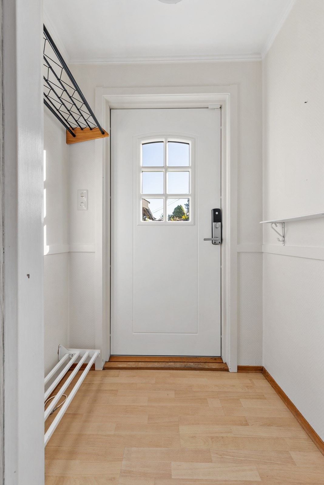 Entréen har plass til oppbevaring av yttertøy og sko. Galleribilde