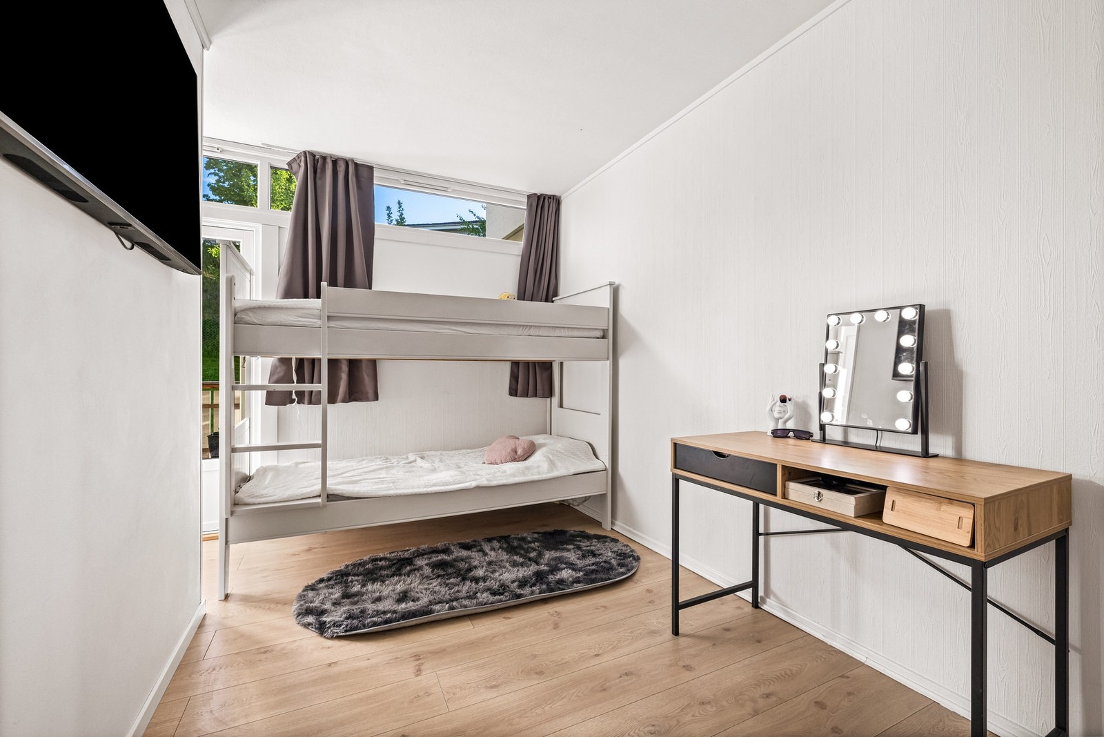 Soverommet som ligger vegg-i-vegg med stuen. Galleribilde