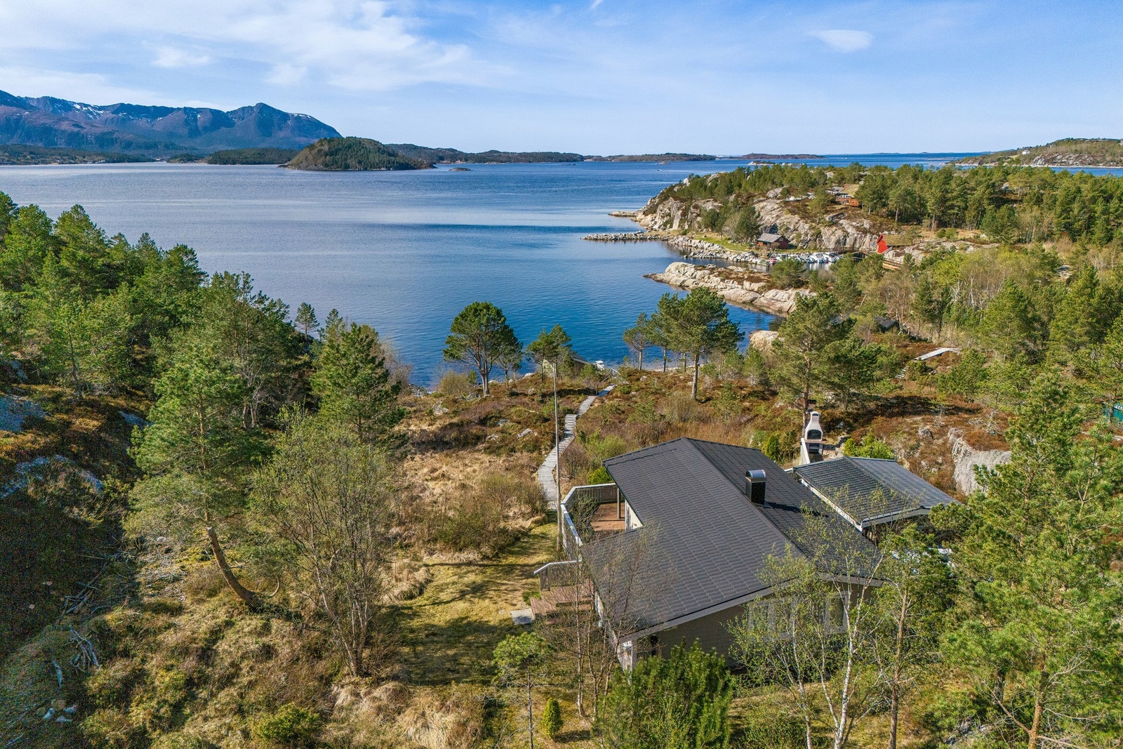 Solrik tomt med kveldssol Galleribilde