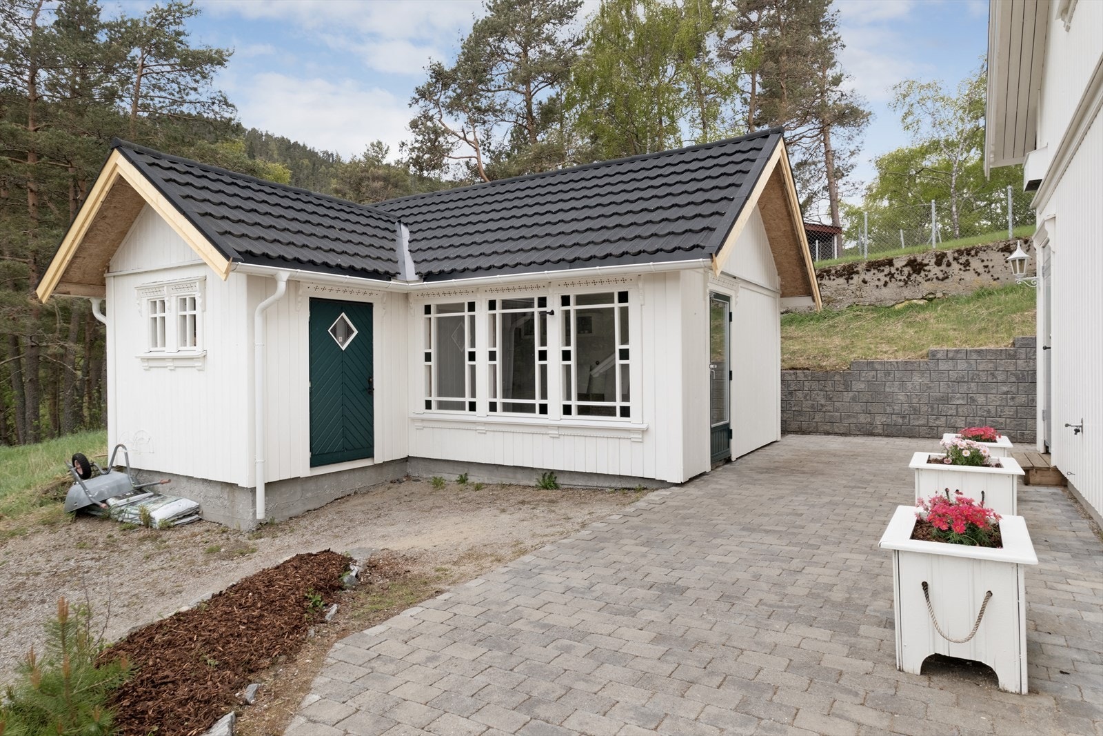 Eigedomen inkluderar ei hagestove som er ideell til lagring eller hobbyrom. Galleribilde