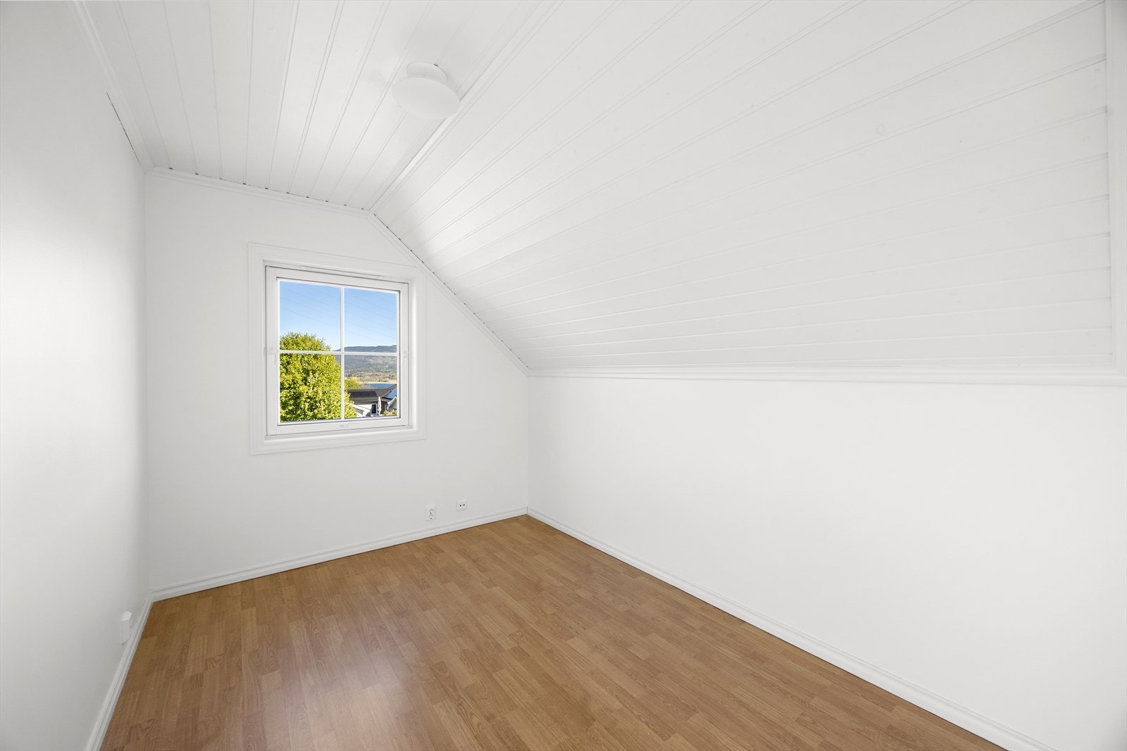 Loftsetasjen byr på fleksible romløsninger for en stor familie. Galleribilde