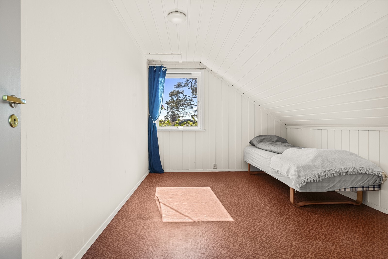 Det tredje soverommet i denne etasjen har også plass til seng og oppbevaring. Galleribilde