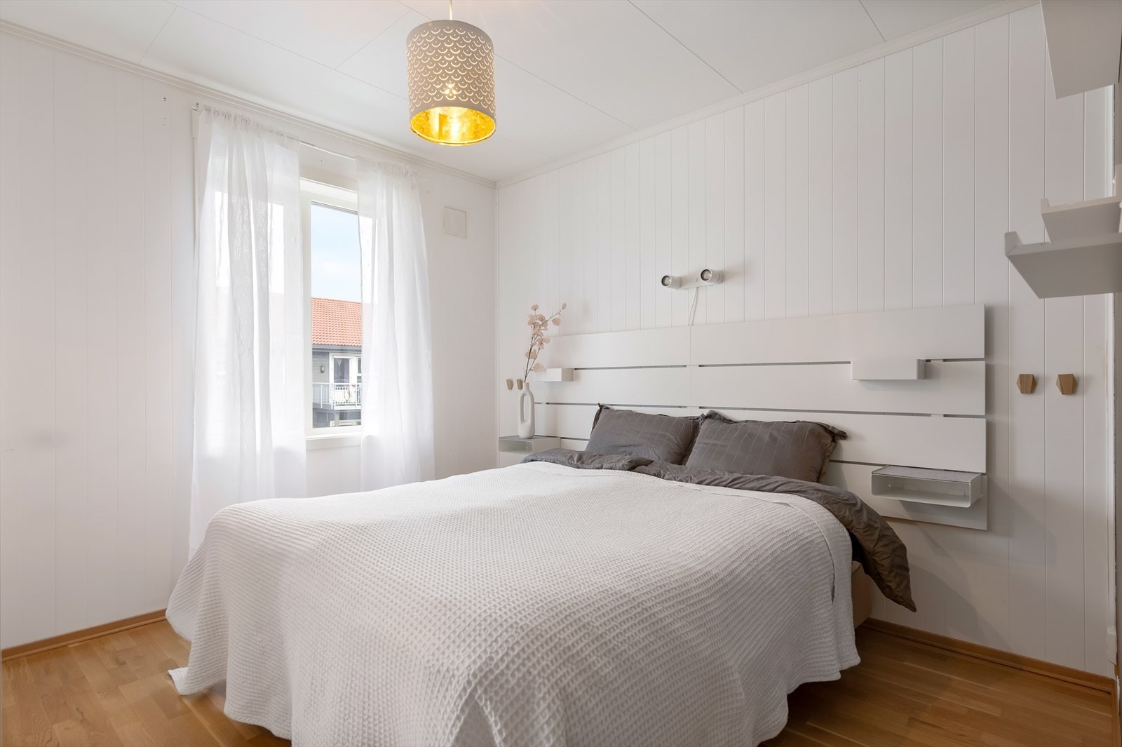 Hovedsoverom i lyse farger. Galleribilde
