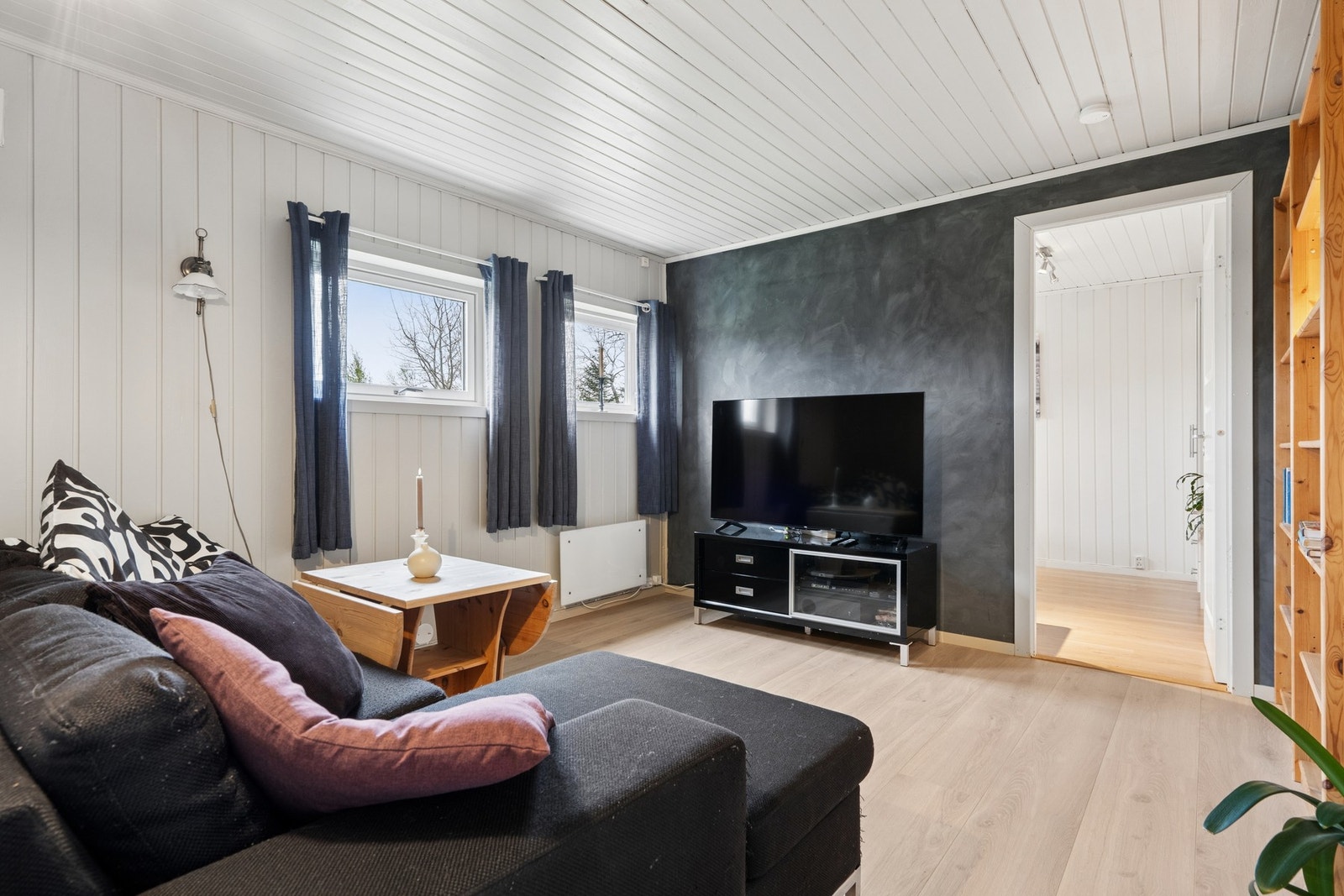 Et fleksibelt rom som kan fungere som TV-stue eller lekerom. Galleribilde