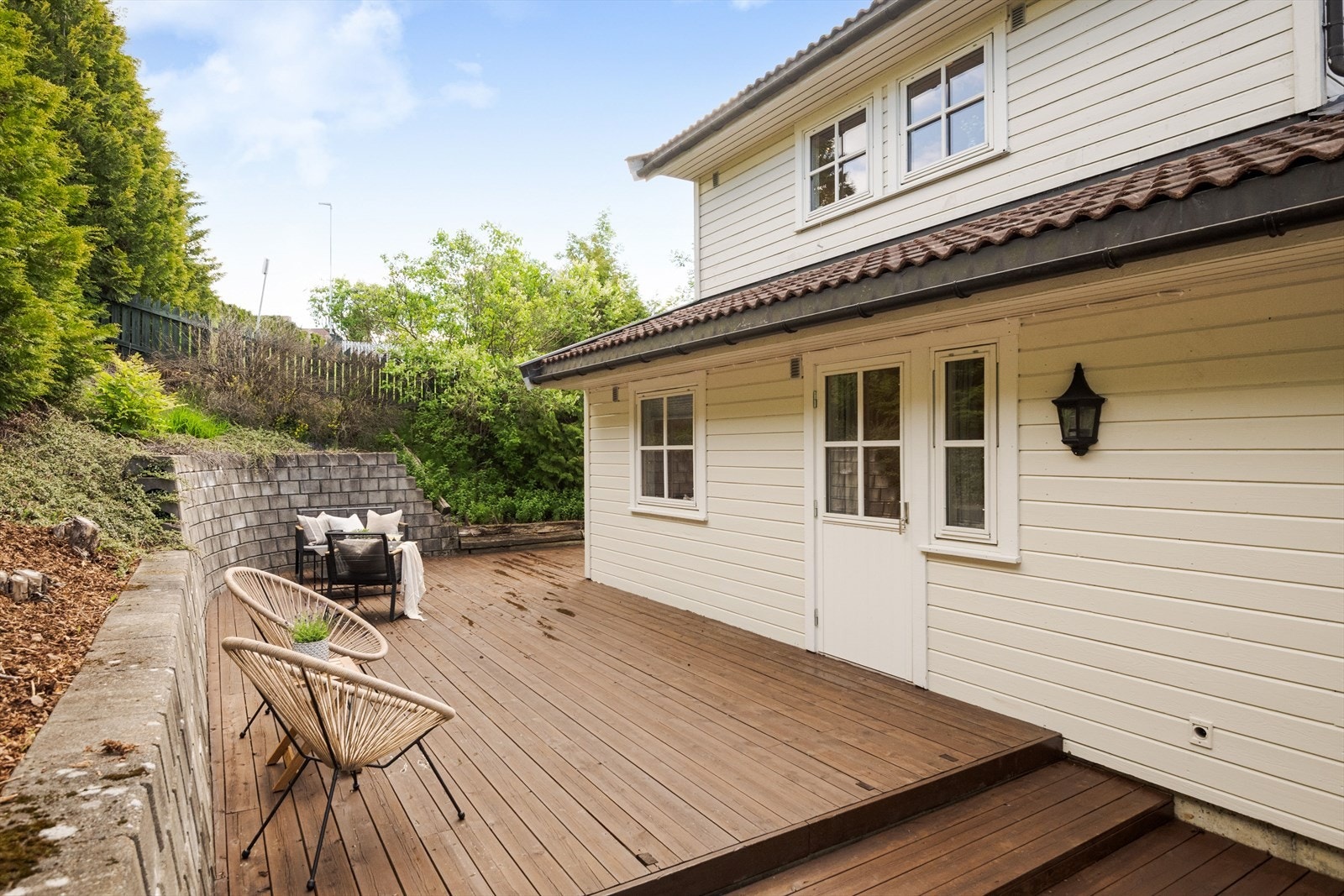 Terrassen oppleves som en frodig liten oase. Galleribilde