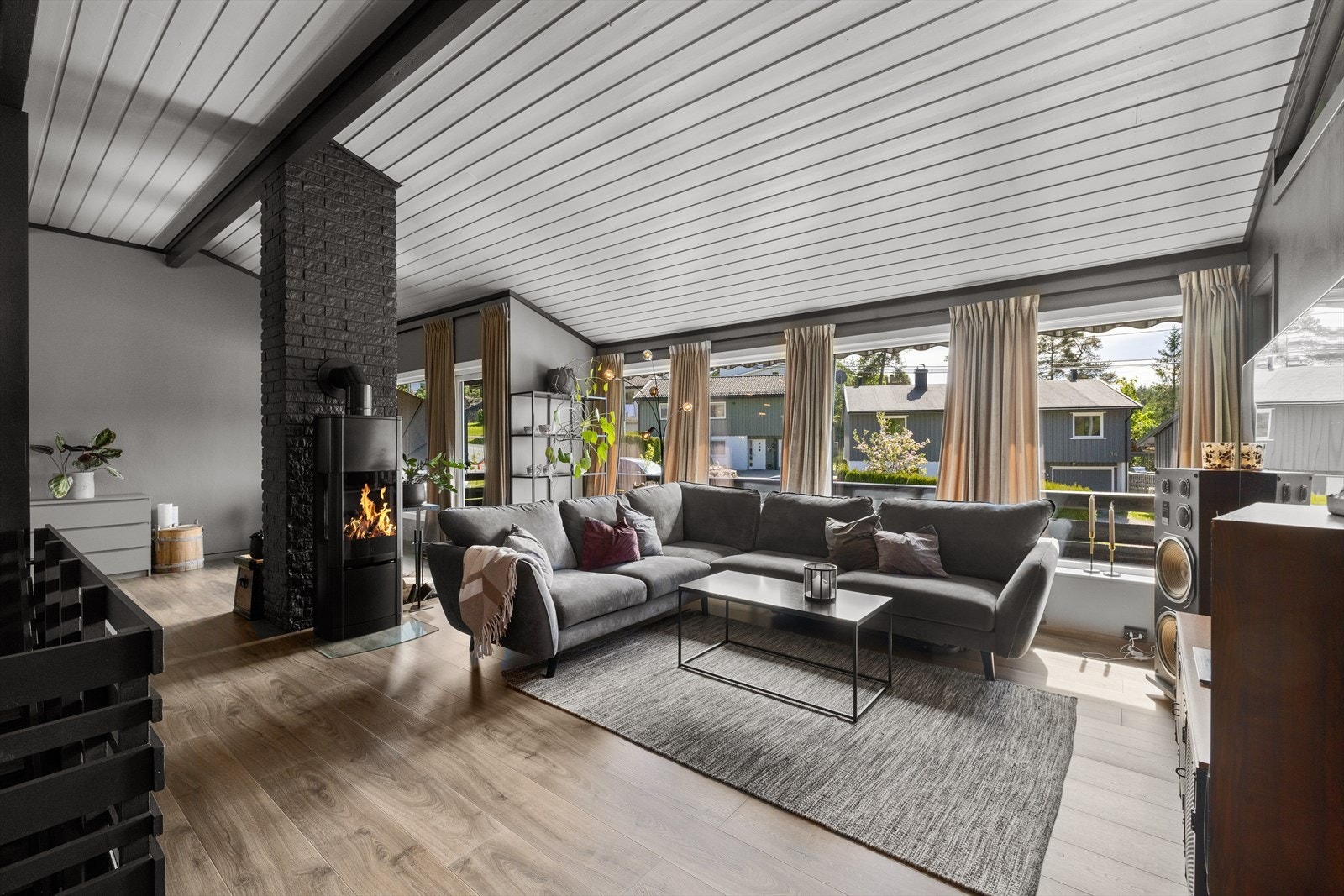 Innbydende og hyggelig stue Galleribilde