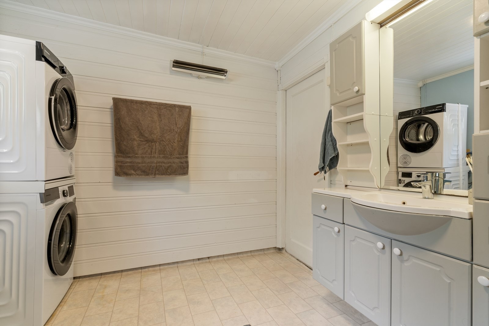 Badet har opplegg for vaskemaskin. Galleribilde