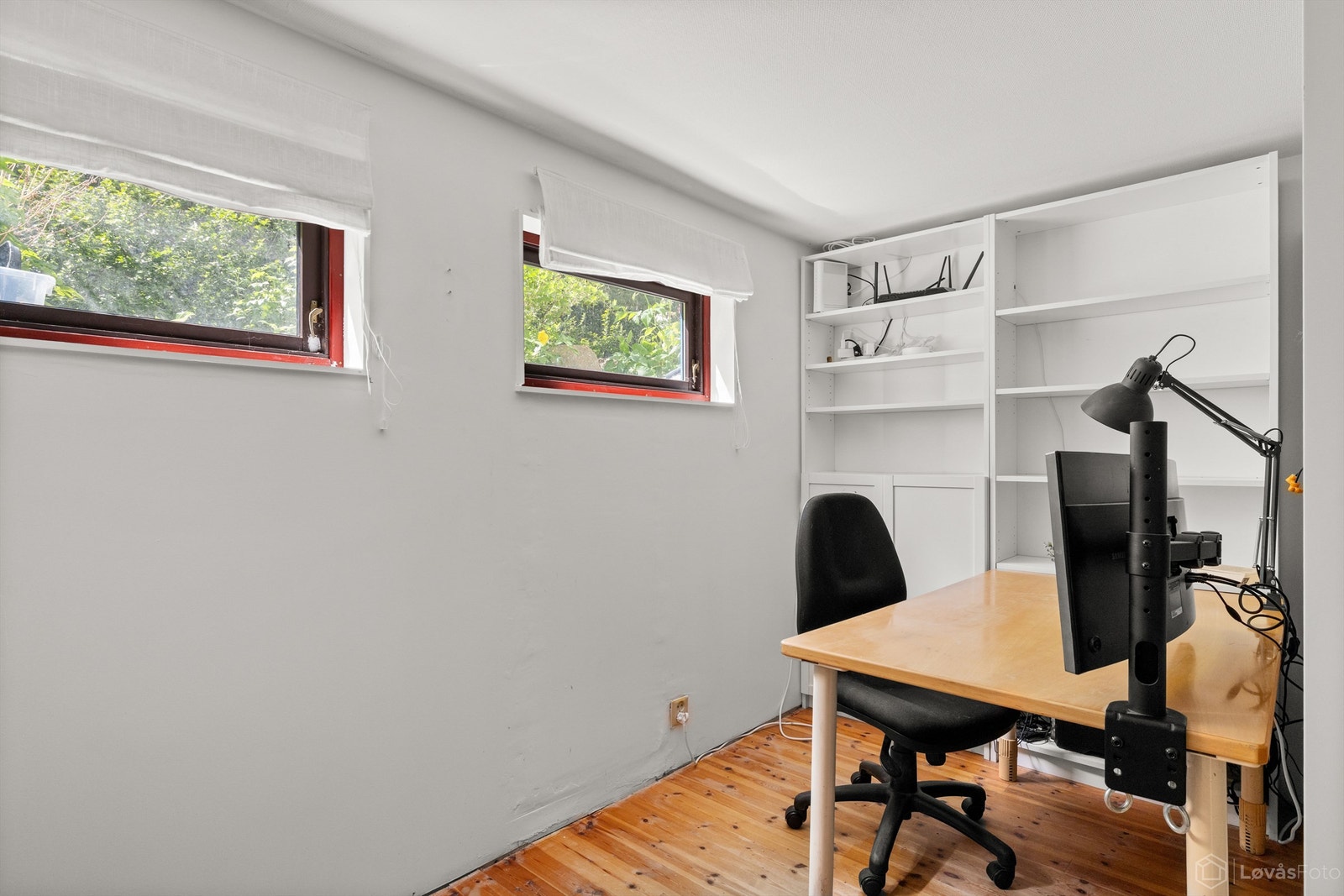 En del av rommet er innredet som en praktisk arbeidsplass. Galleribilde