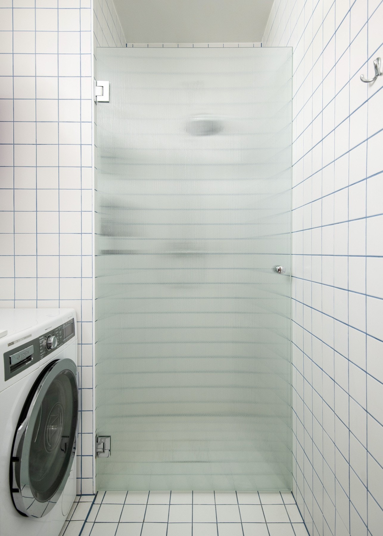 Badet har opplegg for vaskemaskin. Galleribilde