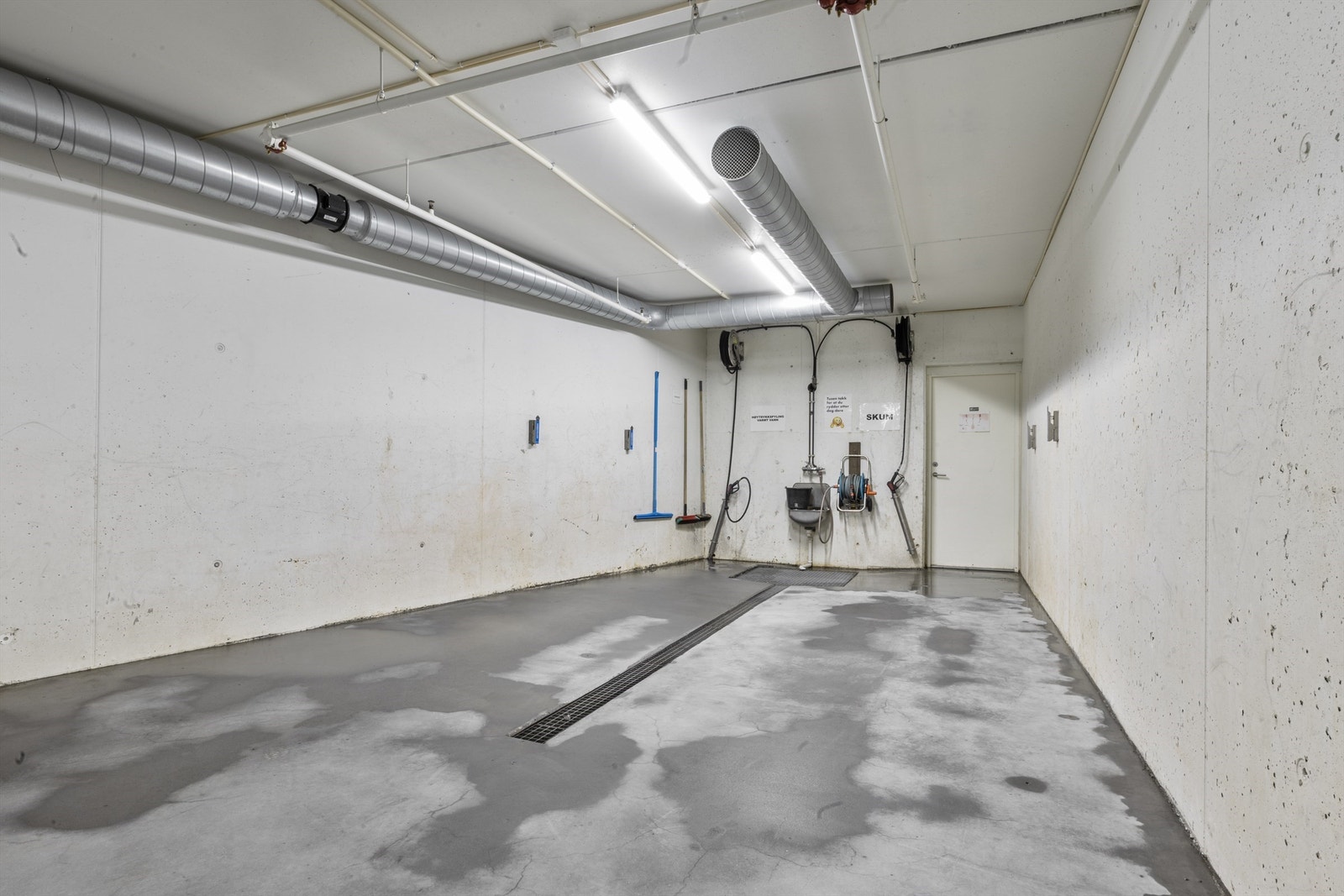 Felles vaskehall i parkeringskjeller. Galleribilde