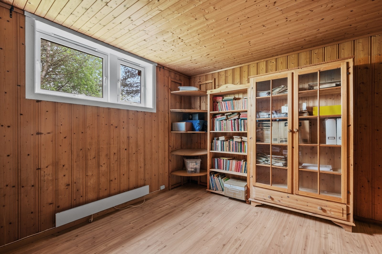 Romslig kjellerstue på 11,5 m². Galleribilde