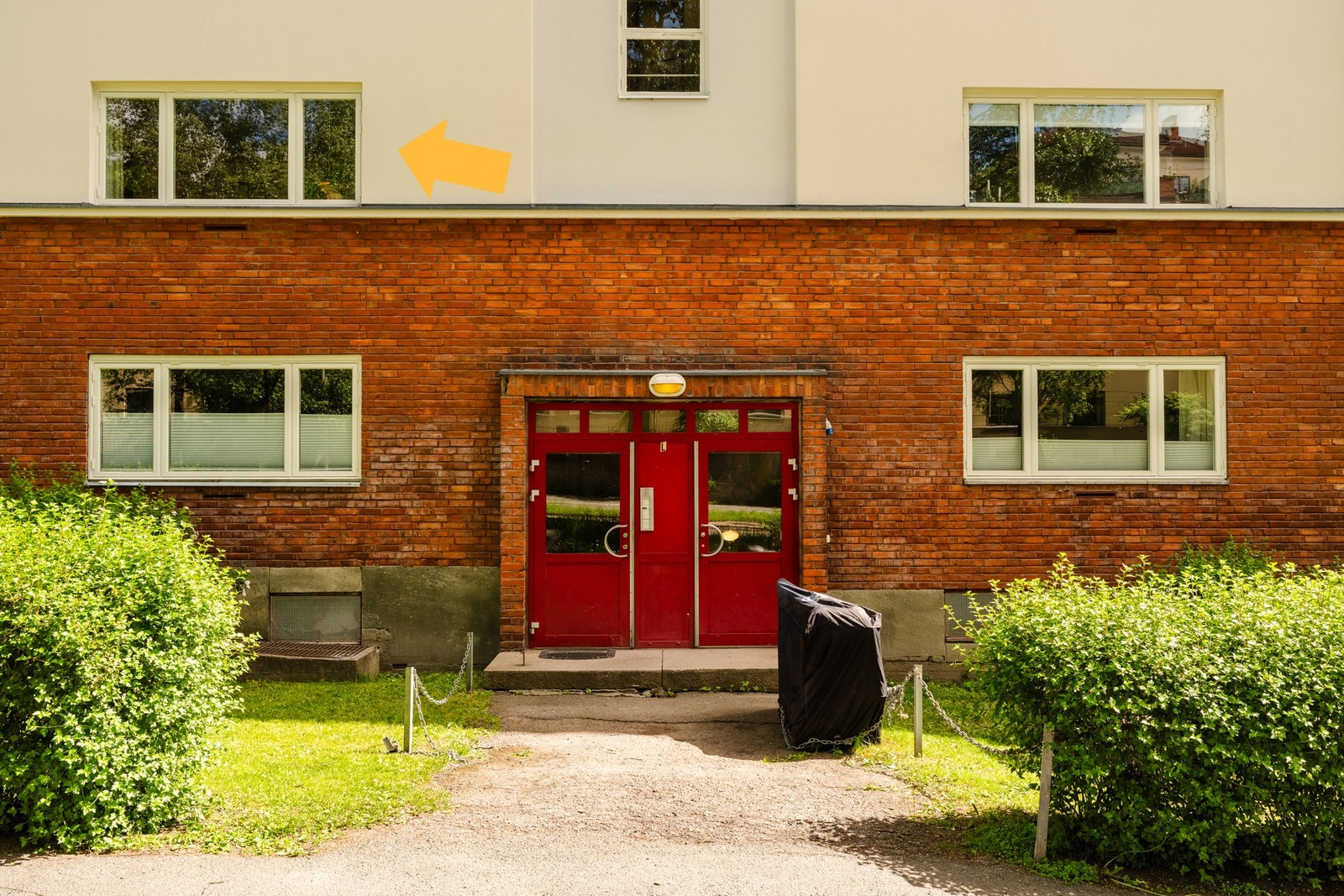 Pil viser leilighetens beliggenhet. Galleribilde