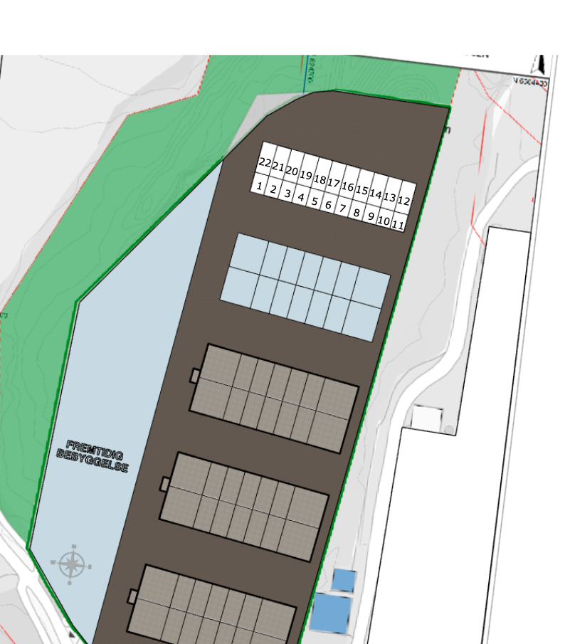 hvit markering med nummer illustrere byggets plassering og de ulike seksjonene. Galleribilde