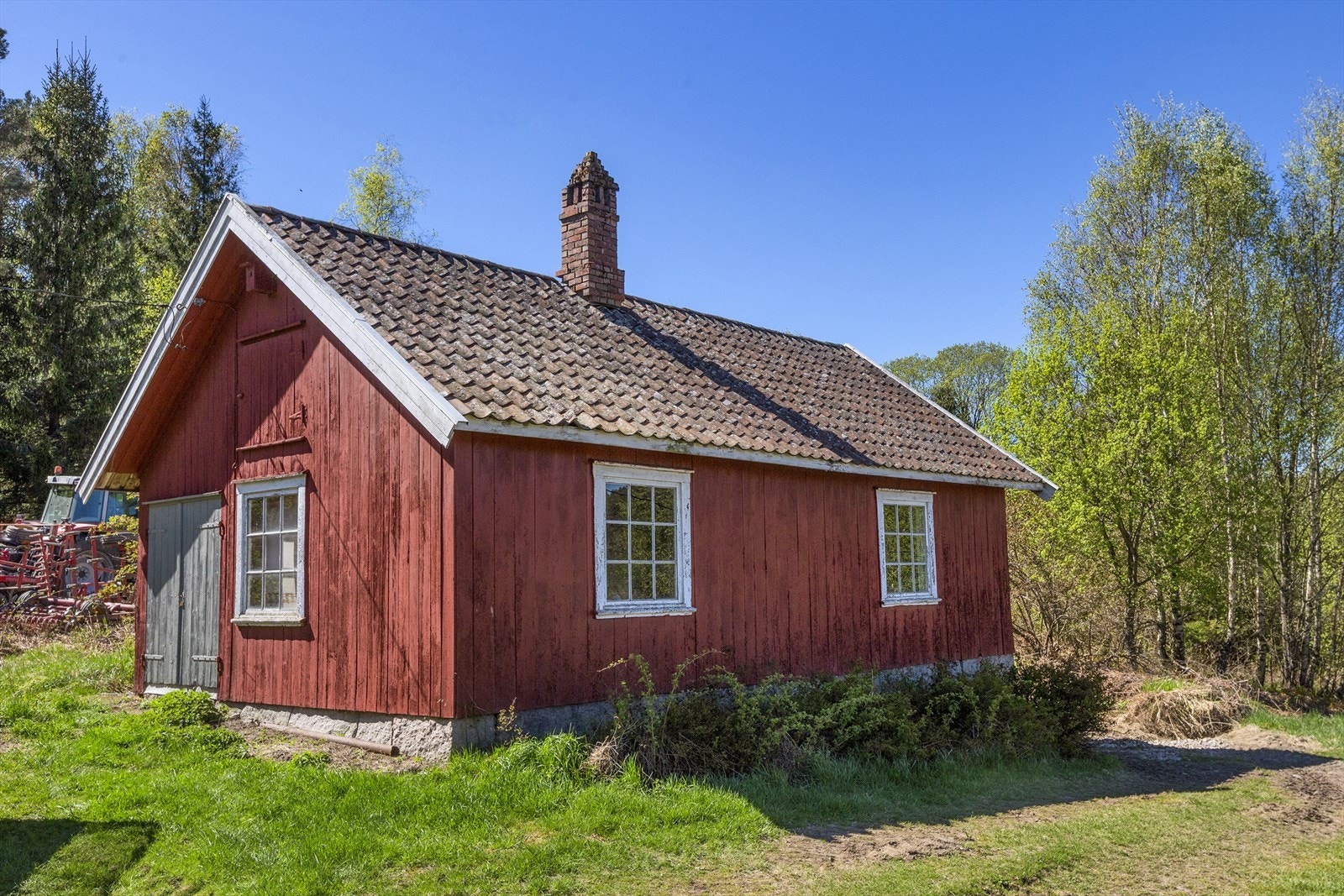 Smiebygningen er benyttet til lagring og som et enkelt verksted. Galleribilde