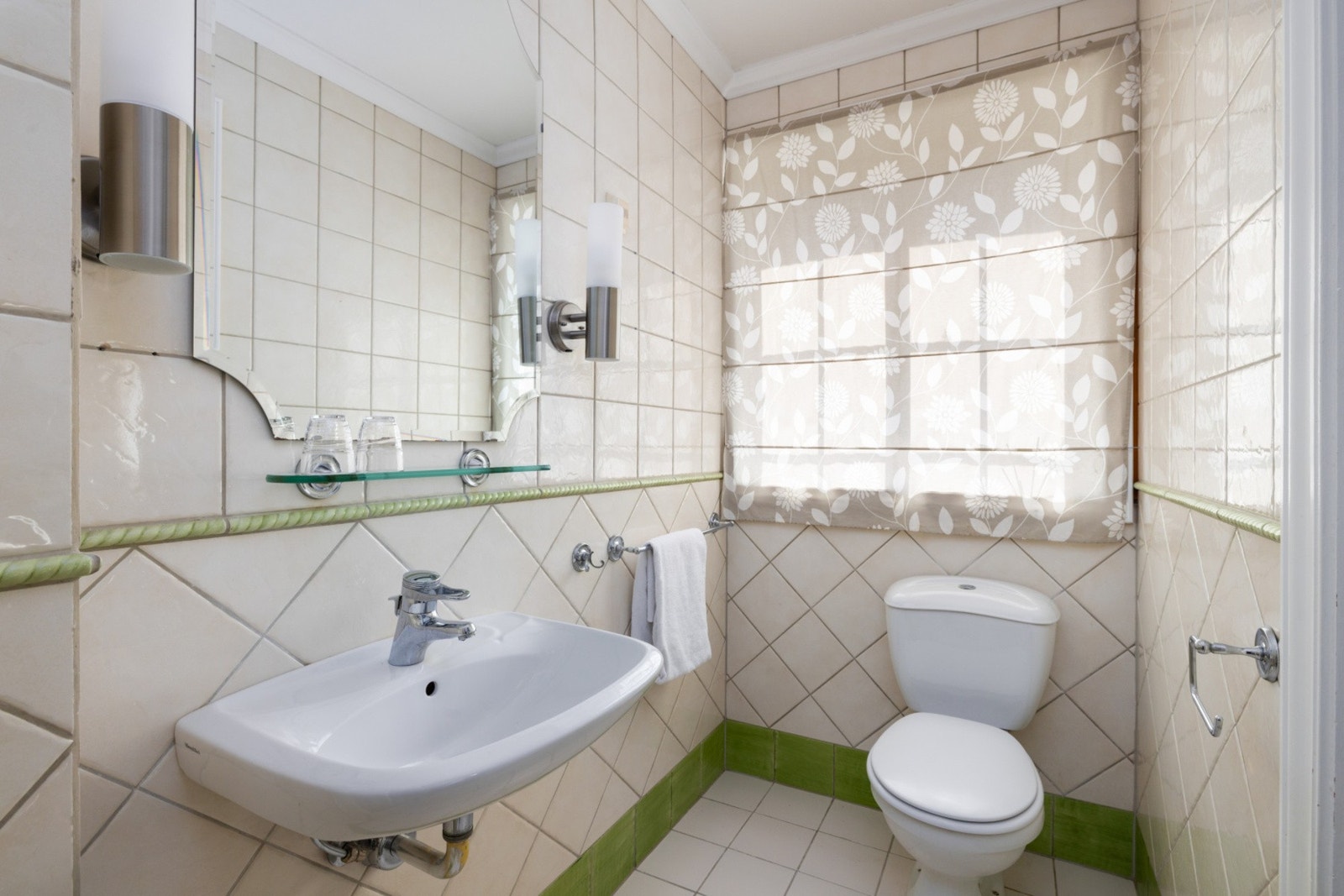 Badet her er ivaretatt med eldre standard for og holde historien i bygget. Galleribilde