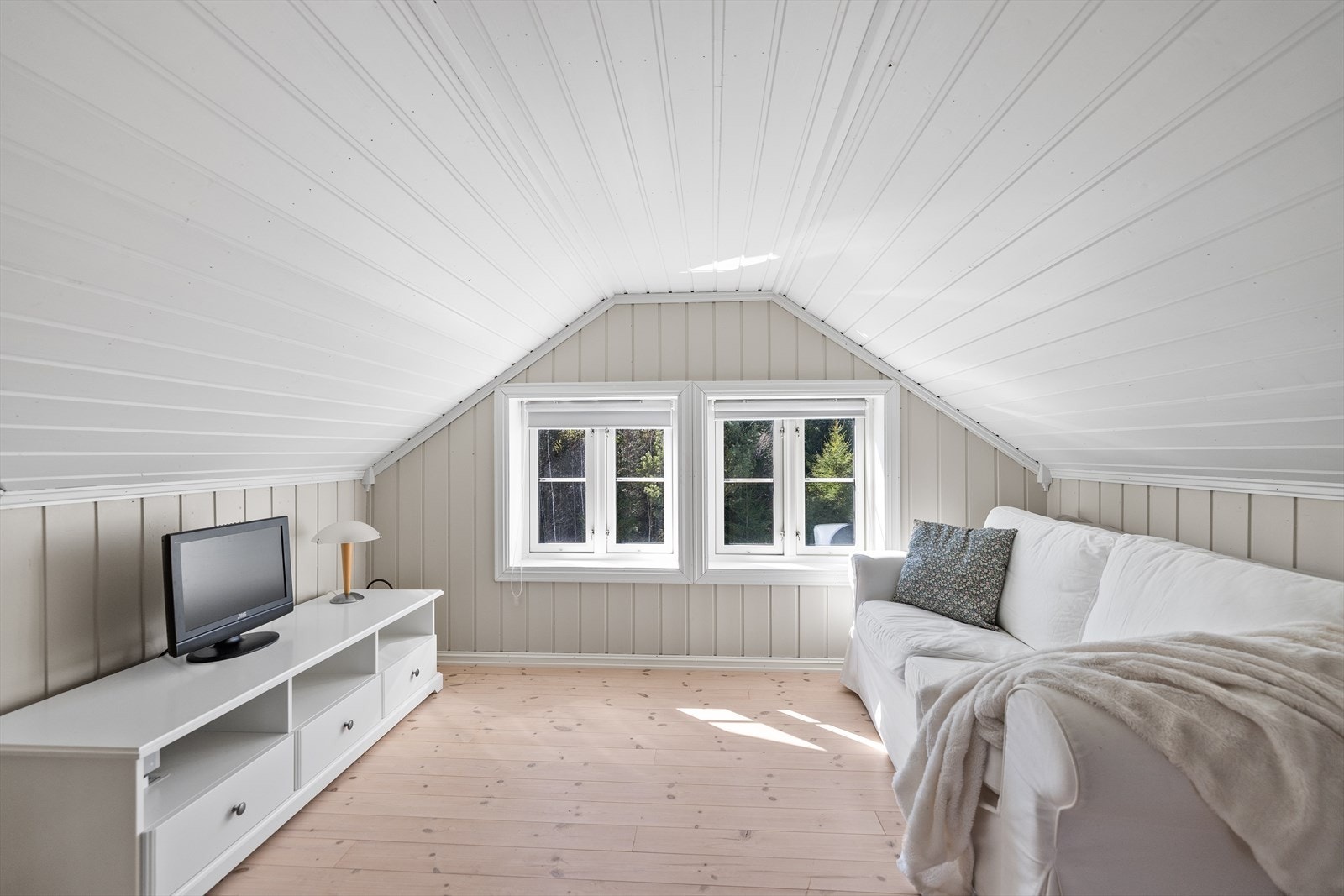 En lun og koselig stue, perfekt for avslapning etter lange, solrike dager ute. Galleribilde