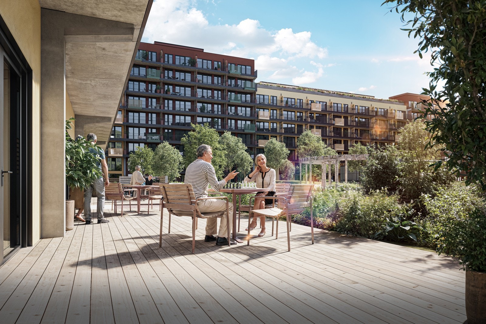 Flott utvendt felles terrasse utenfor den felles stuen/spisestuen/kjøkkenet Galleribilde