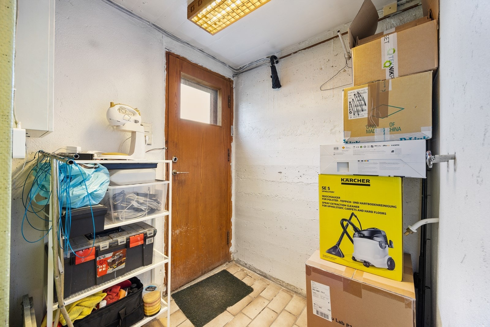En av bodene i kjelleren med egen utgang. Galleribilde