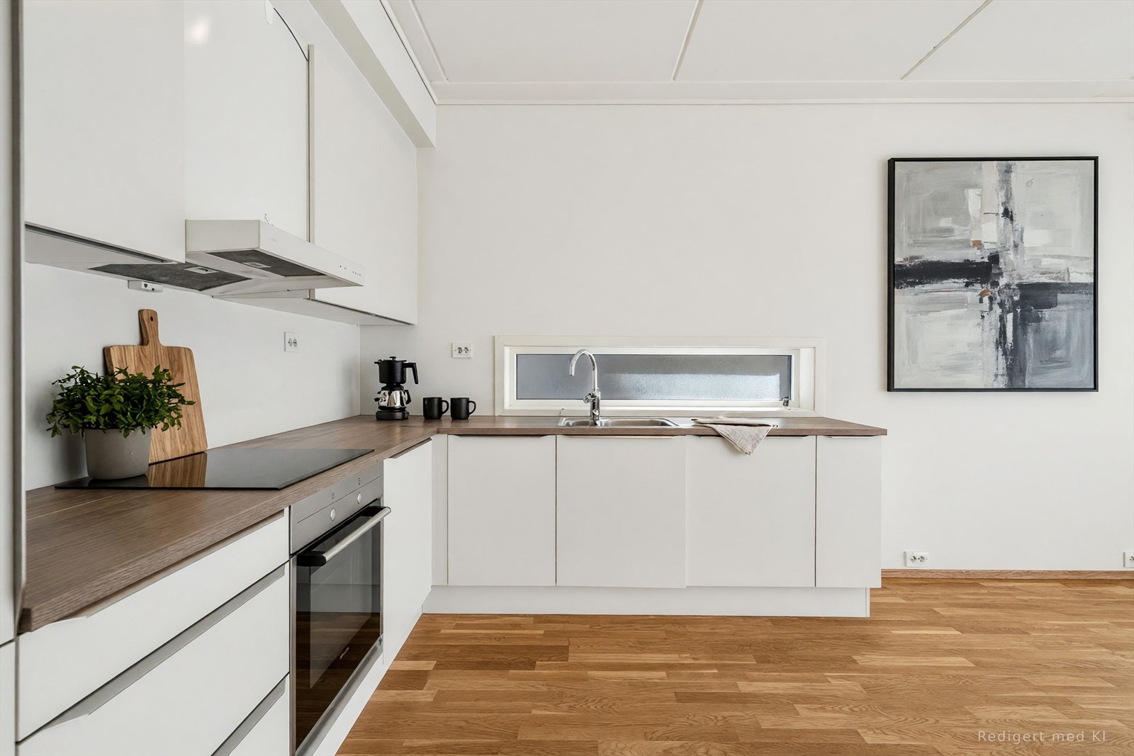Det moderne kjøkkenet er det første som møter deg etter entréen. (vi gjør oppmerksom på at bildet er digitalt møblert og at feil kan forekomme). Galleribilde