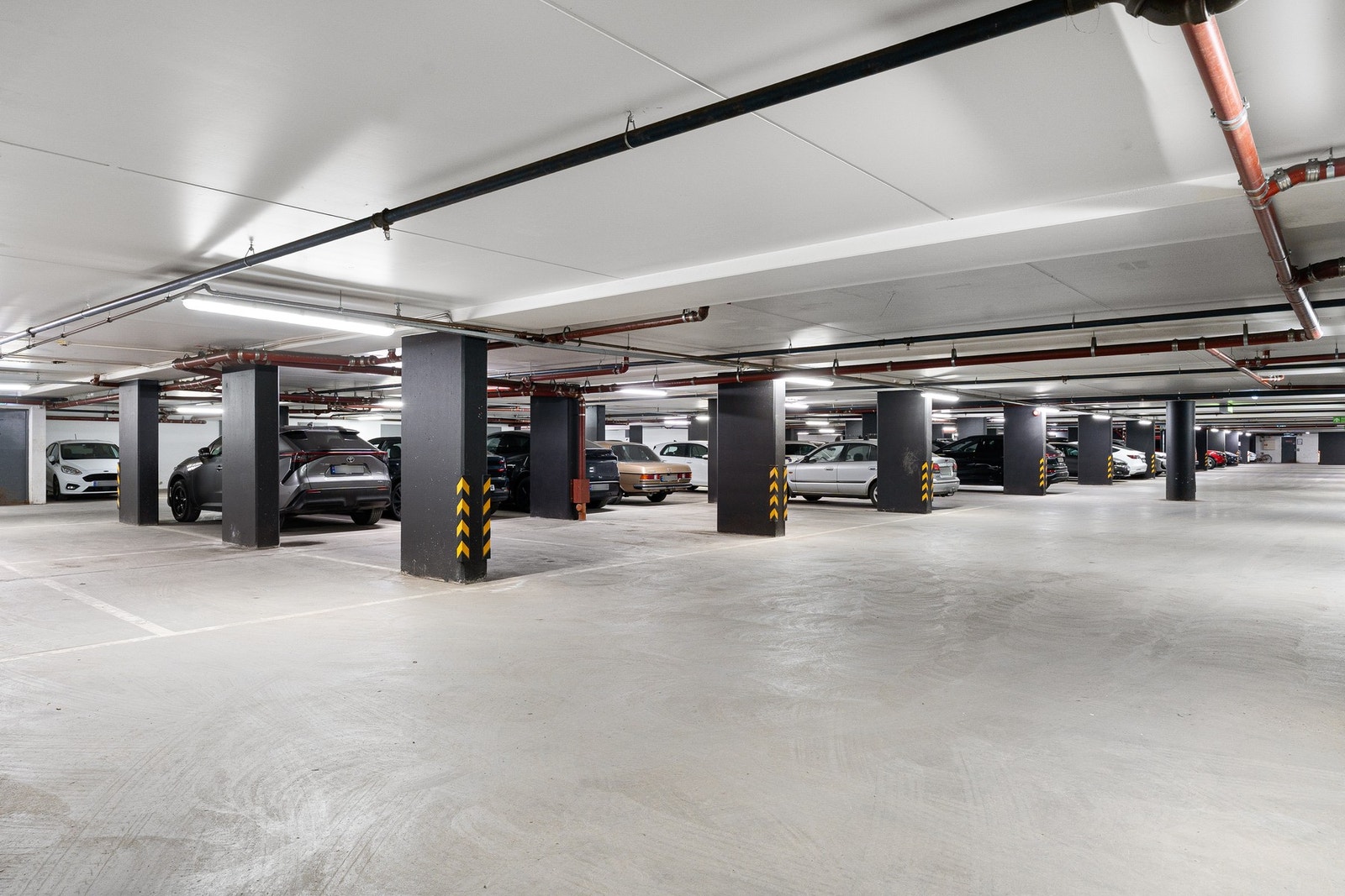 Mulighet for å leie en parkeringsplass i garasjeanlegget. Aimo Park står for utleie av garasjeplassene. Galleribilde