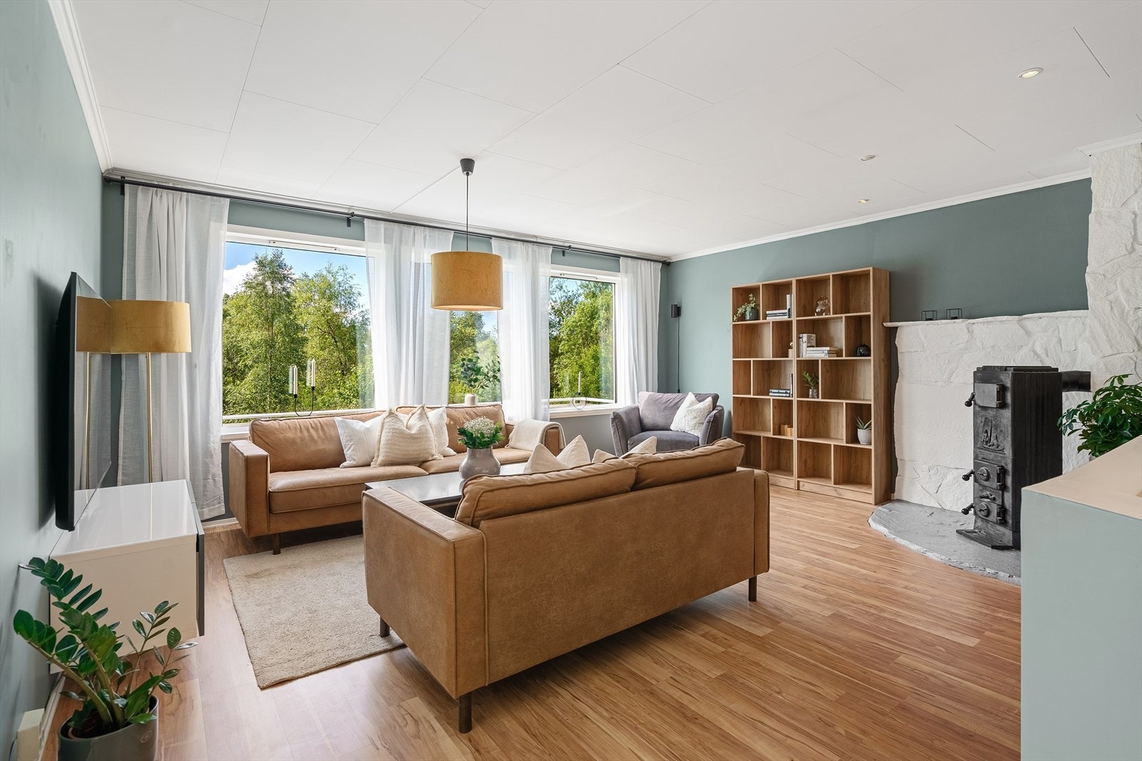 Stue som inviterer til både ro og liv - alt etter behov. Galleribilde
