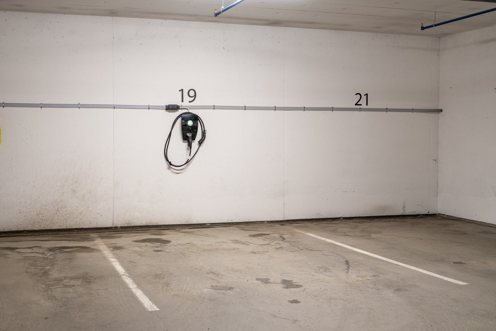 Det medfølger også fast p-plass i parkeringskjeller med elbillader. Galleribilde