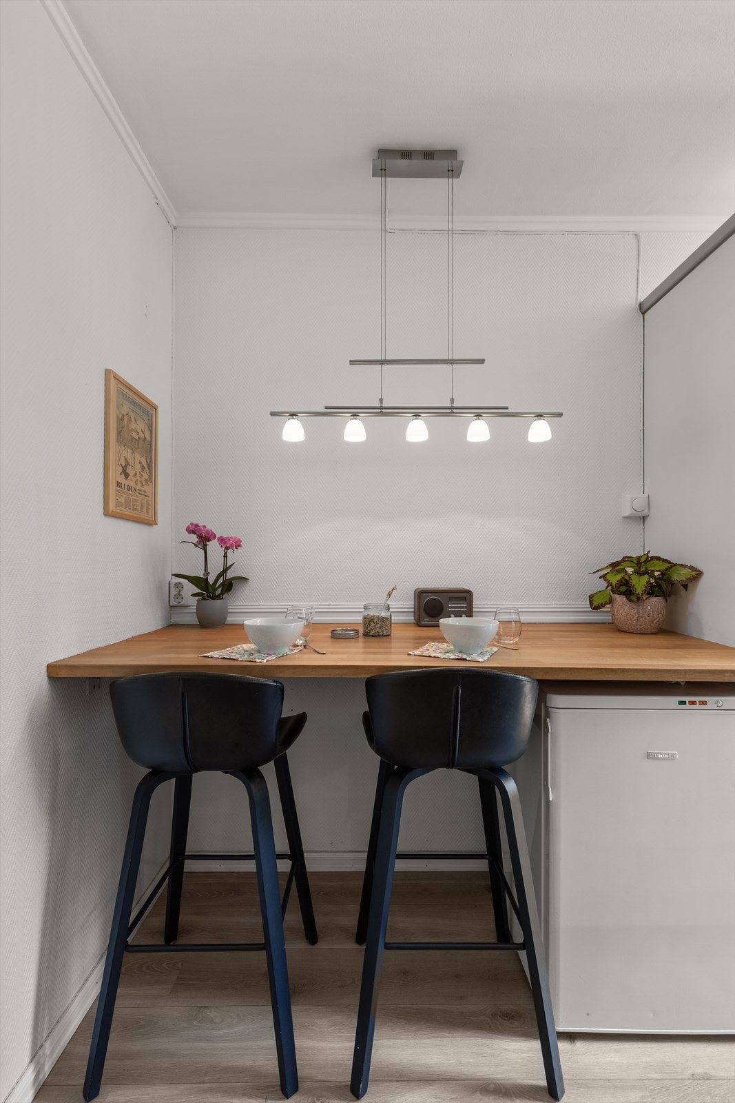 En smart barløsning gir en uformell spiseplass for to. Galleribilde