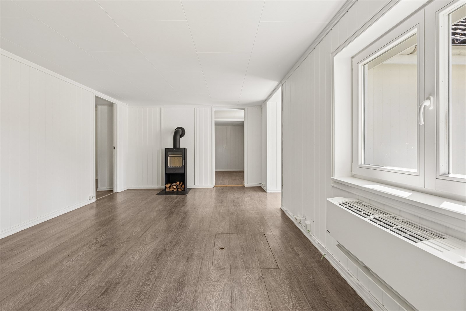 Vedovnen er tilknyttet en mursteinspipe som ble rehabilitert innvendig i 2022. Galleribilde