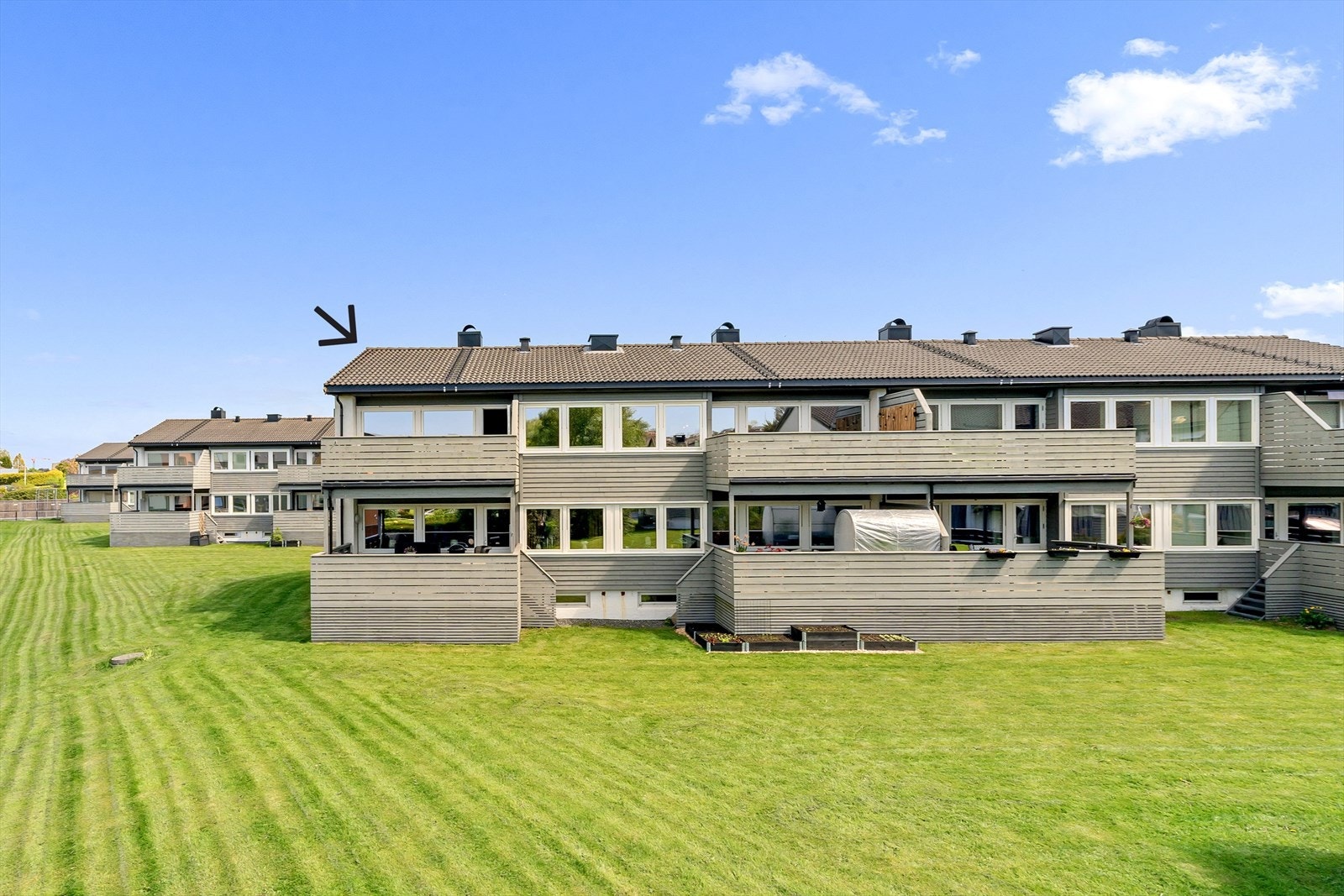 En sjarmerende topp- og endeleilighet med romslig og solrik balkong. Galleribilde