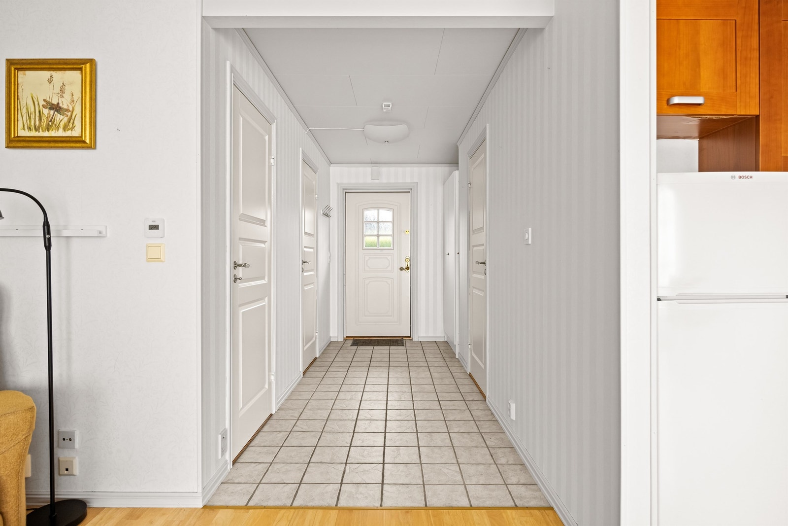 Flislagt entre med varme i gulvene. Galleribilde