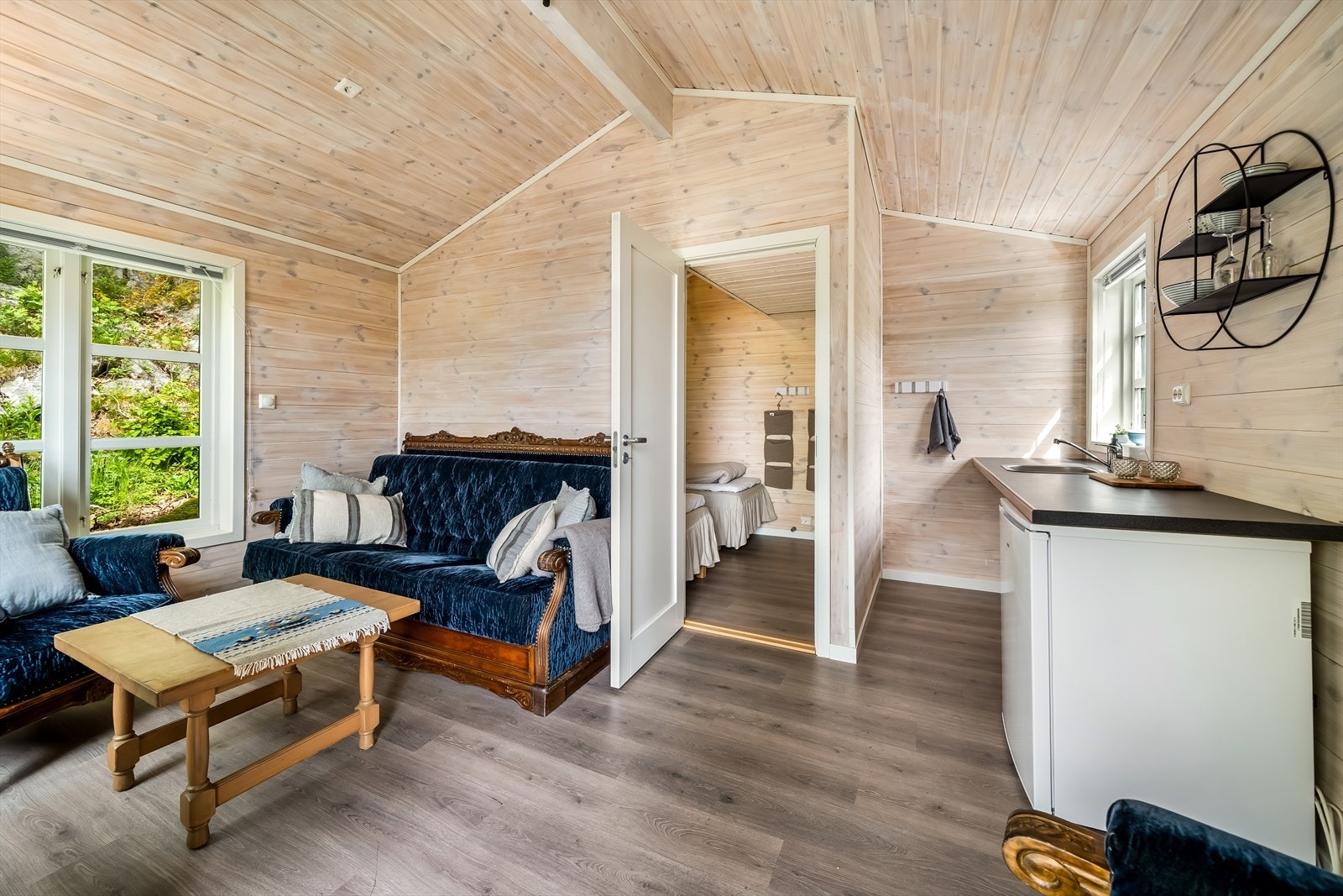Annekset inneholder stue med kjøkkenkrok, soverom og WC. Galleribilde