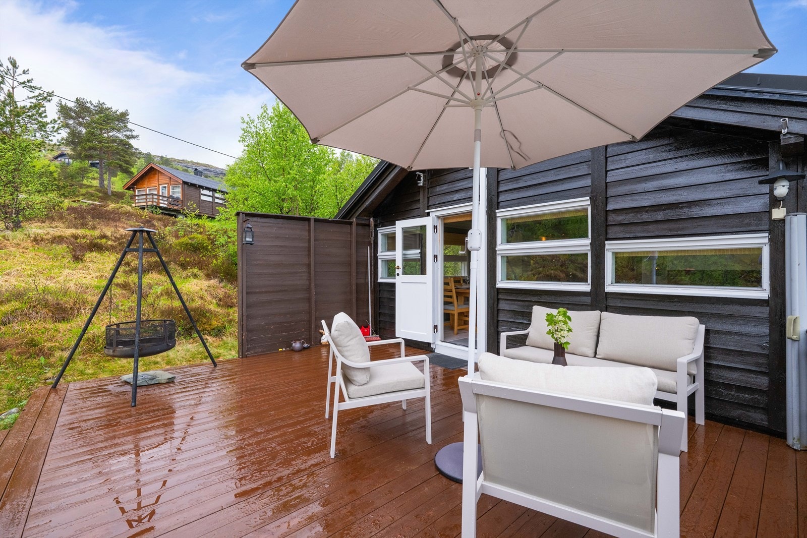 Fra stuen er det utgang til en terrasse på ca. 21 m² Galleribilde