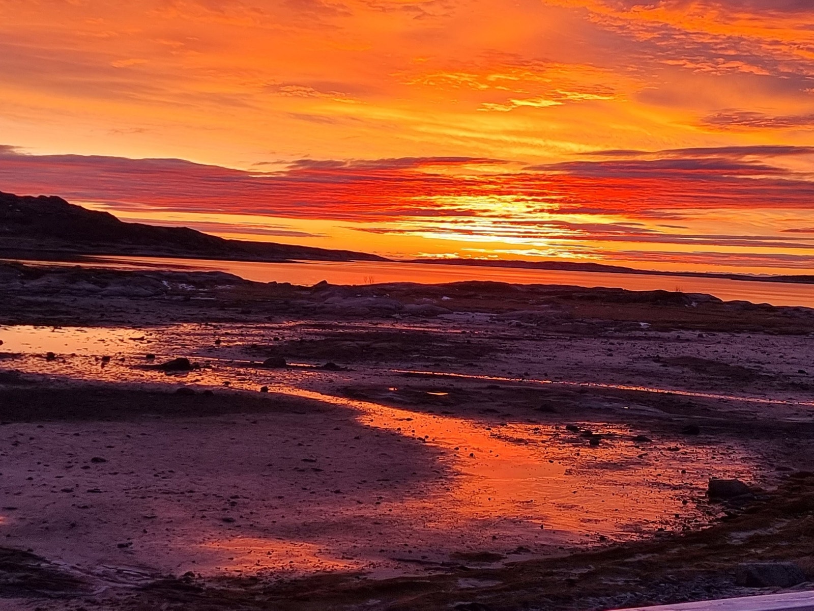 Solnedganger som minner om ett maleri. Galleribilde