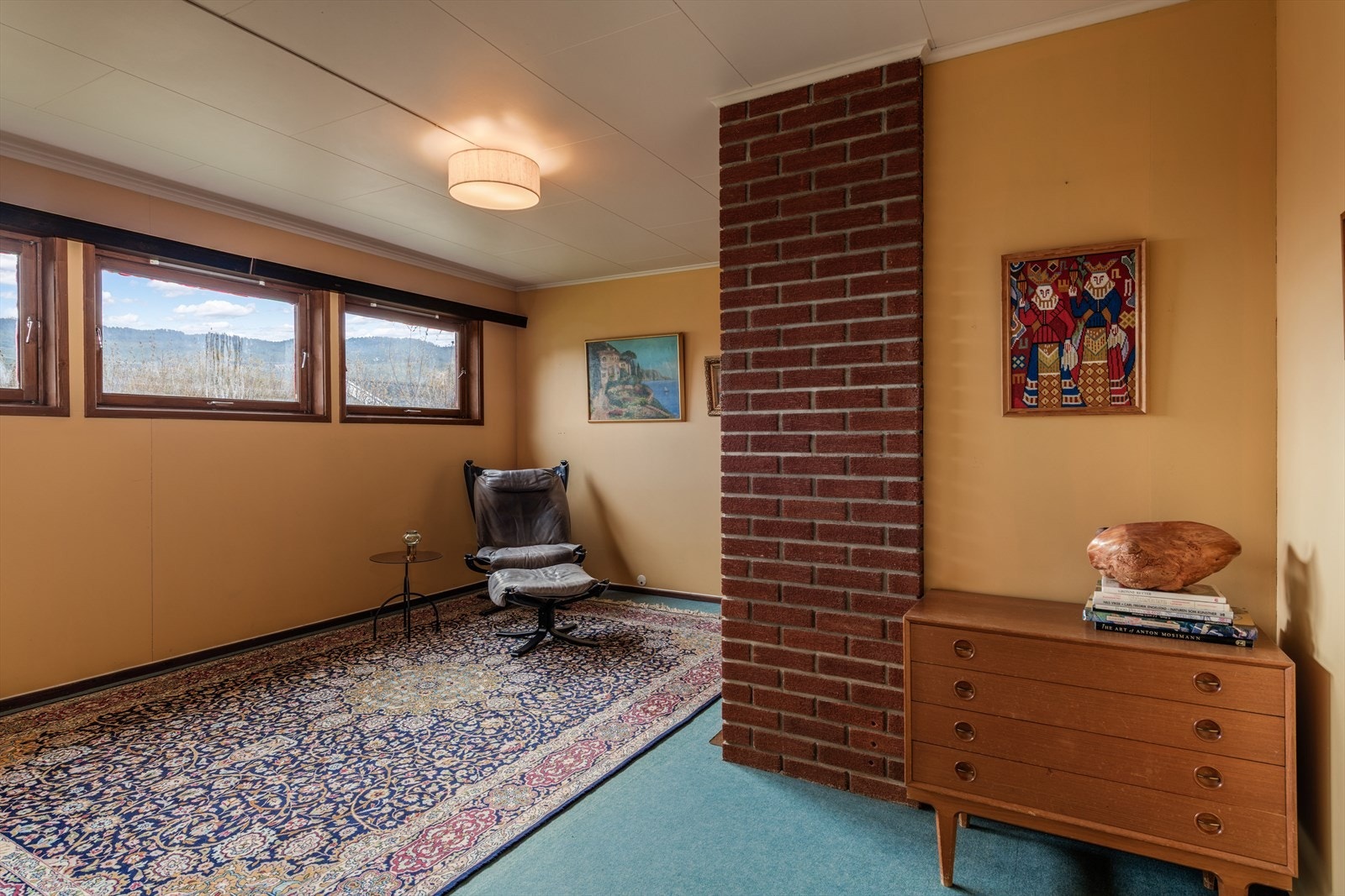 Gulvet i kjellerstuen har varmekabler for økt komfort. Galleribilde