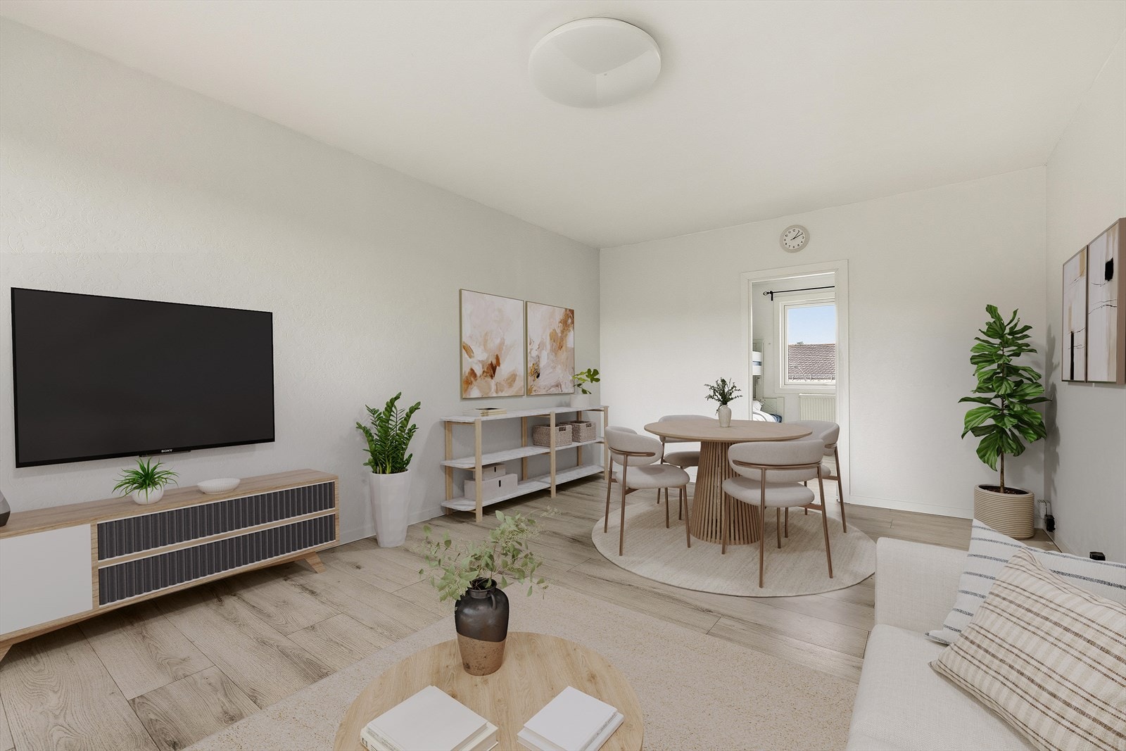 -Stuen har en romslig utforming med naturlige soner for sofagruppe og spisebord - Galleribilde