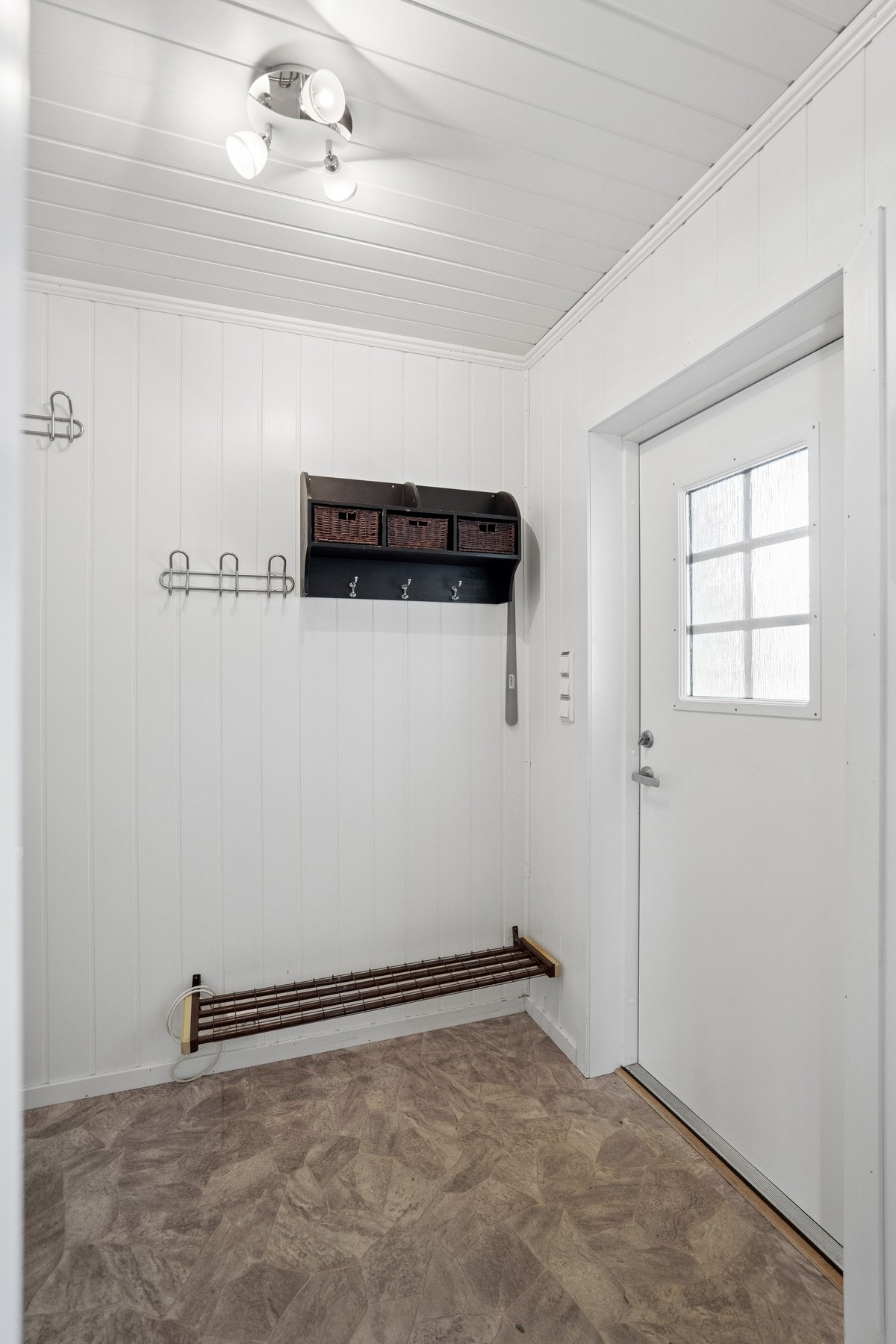 Entré med plass til oppbevaring av yttertøy og sko. Galleribilde