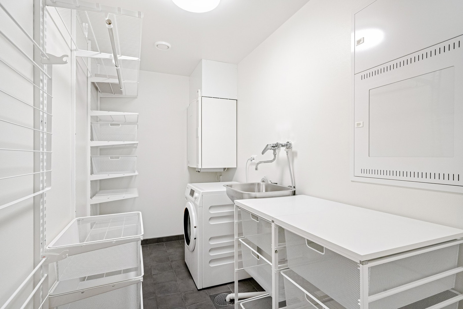 Leiligheten har eget vaskerom, meget unikt for denne type bolig! Galleribilde