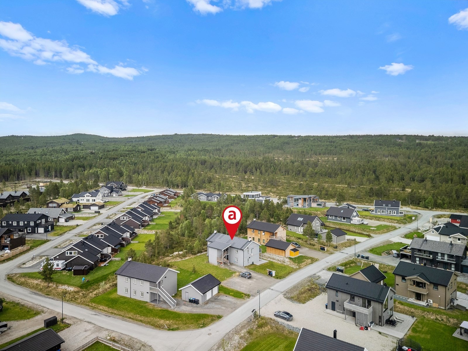 Oppstillingsplass til hver enkelt leilighet på felles tomt. Galleribilde